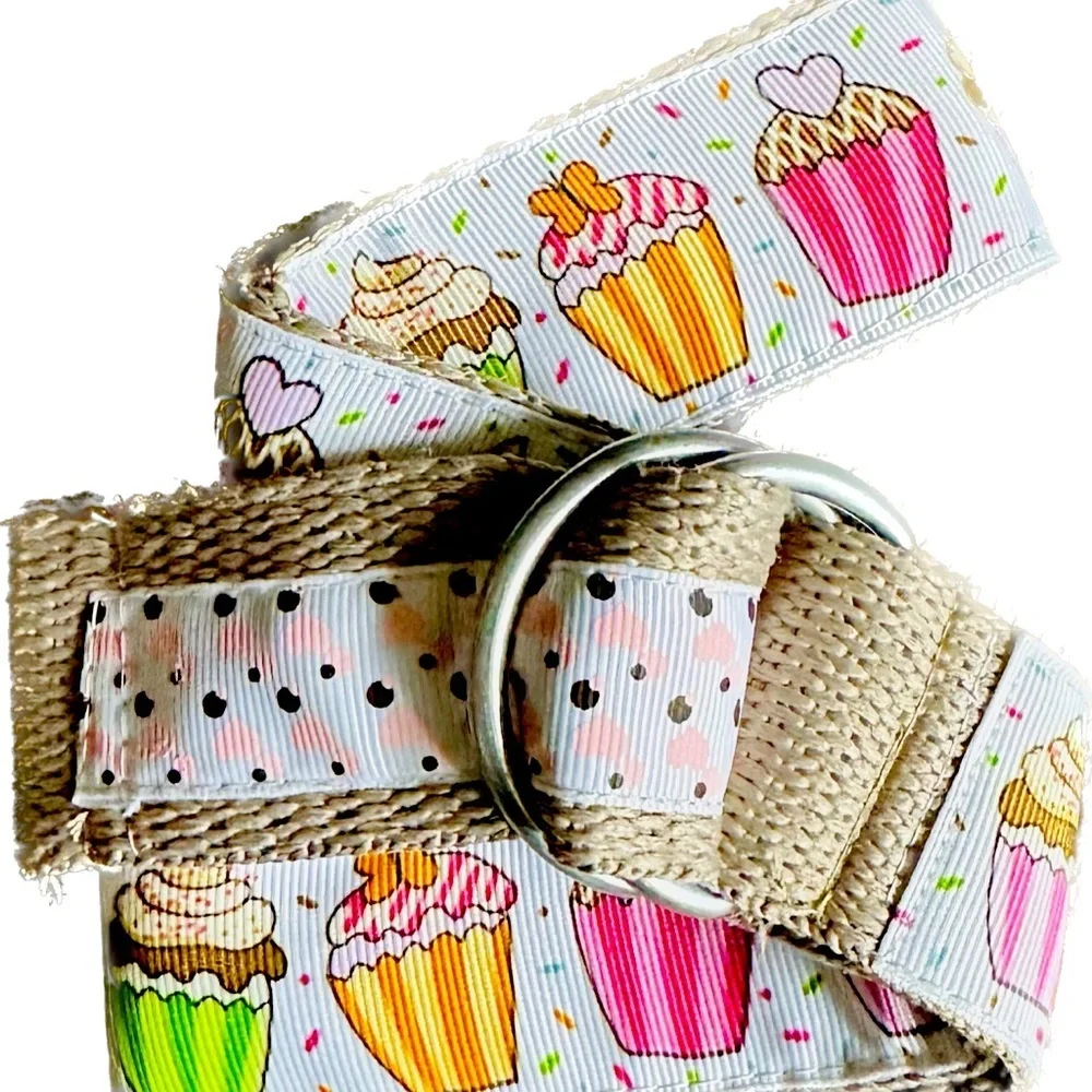 Belt, cupcakes and reverses to hearts on backside Celebrate in style.Adjustable